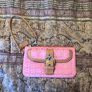 Pink coach wristlet